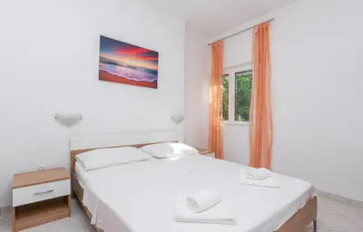 Krevet ili kreveti u jedinici u objektu Apartments Marko