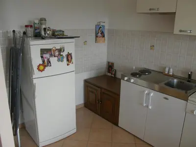 Kuhinja ili čajna kuhinja u objektu Apartment in Duce with sea view, terrace, air conditioning, washing machine (595-1)