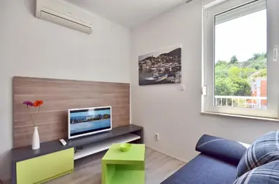 TV i/ili zabavni centar u objektu Bretia Apartments
