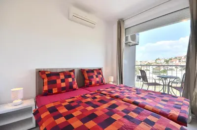 Krevet ili kreveti u jedinici u objektu Bretia Apartments
