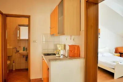 Krevet ili kreveti u jedinici u objektu Apartments Sandy Beach