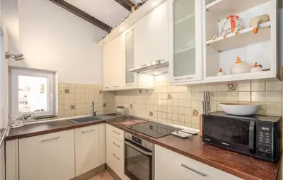 Kuhinja ili čajna kuhinja u objektu Nice Home In Zvecanjegata