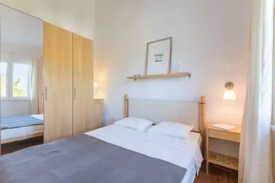 Krevet ili kreveti u jedinici u objektu Sutivan seaside apartment