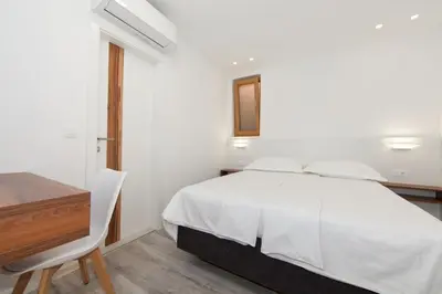 Krevet ili kreveti u jedinici u objektu Apartment in Brela with sea view, balcony, air conditioning, WiFi (3524-9)