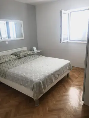 Krevet ili kreveti u jedinici u objektu Apartments with parking space Makarska - 18170