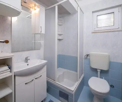 Kupaonica u objektu Sail Away Beach Apartment