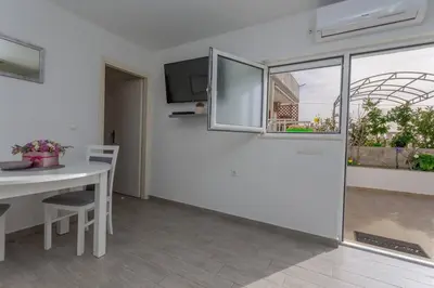 TV i/ili zabavni centar u objektu Queen Hvar Luxury Apartment Jacuzzi & Bikes