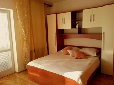 Krevet ili kreveti u jedinici u objektu Apartmani Marin- MAKARSKA