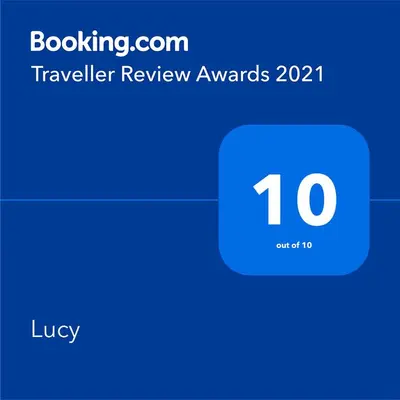 Certifikat, nagrada, logo ili neki drugi dokument izložen u objektu Lucy