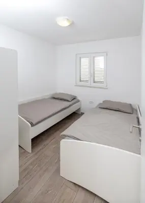 Krevet ili kreveti u jedinici u objektu Nane Garden house with heated pool