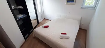 Krevet ili kreveti u jedinici u objektu Penthaus Apartment N&M