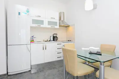 Kuhinja ili čajna kuhinja u objektu Apartments by the sea Sumpetar, Omis - 18286