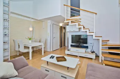 TV i/ili zabavni centar u objektu Relaxing holiday sunset apartment