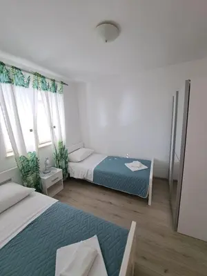 Krevet ili kreveti u jedinici u objektu Apartman Leon
