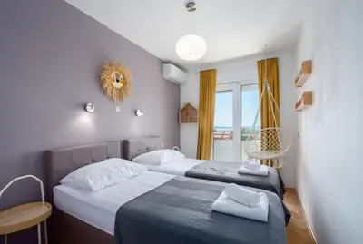 Krevet ili kreveti u jedinici u objektu Seaside vila Perla