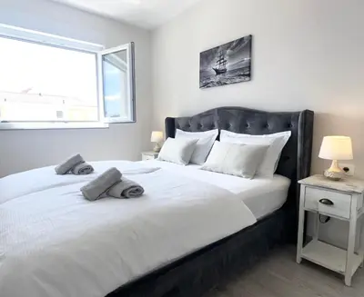Krevet ili kreveti u jedinici u objektu Fiori Boutique Apartment