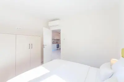 Krevet ili kreveti u jedinici u objektu TINEL Boutique Apartment