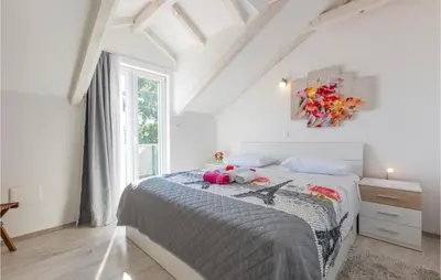 Krevet ili kreveti u jedinici u objektu Beach Front Home In Jesenice