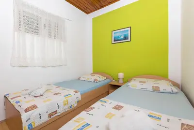 Krevet ili kreveti u jedinici u objektu Apartments Mirko