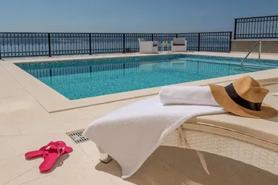 Bazen u objektu Villa Sun Palace with luxury 5 bedroom villa and amazing panoramic sea views ili u blizini