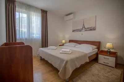 Krevet ili kreveti u jedinici u objektu Villa Elin - Private Pool & Peaceful Family Retreat near Omiš