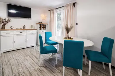TV i/ili zabavni centar u objektu Holiday home Beyla