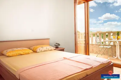 Krevet ili kreveti u jedinici u objektu Apartments Turić