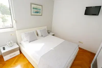 Krevet ili kreveti u jedinici u objektu Luxury Family Apartment Omiš
