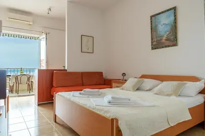 Krevet ili kreveti u jedinici u objektu Sea view Apartment Studio for 2-3 people - close to commodities