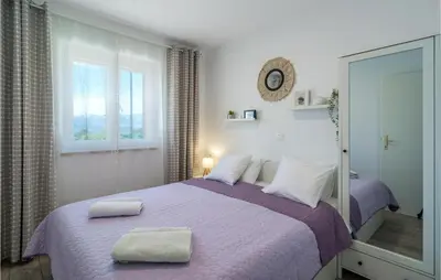 Krevet ili kreveti u jedinici u objektu Beach Front Home In Postira