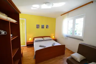 Krevet ili kreveti u jedinici u objektu Apartments Šimić