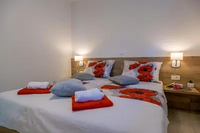 Krevet ili kreveti u jedinici u objektu Apartmani Irena&Miro Brela