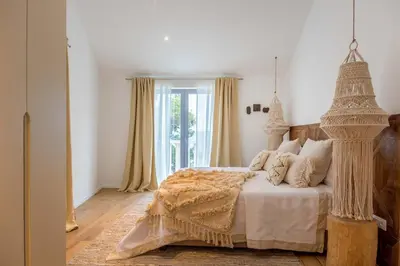 Krevet ili kreveti u jedinici u objektu Charming Bohemian Chic Style Villa 4 Bedrooms Villa Punti Waterfront Sea