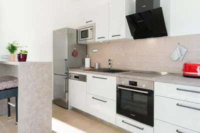 Kuhinja ili čajna kuhinja u objektu Beach Residences Caroline