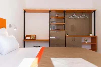 Krevet ili kreveti u jedinici u objektu Beach Residences Caroline