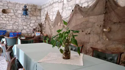Restoran ili neka druga zalogajnica u objektu Guesthouse Lidija