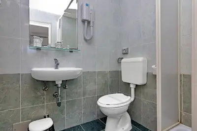 Kupaonica u objektu Rooms Ana