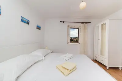 Krevet ili kreveti u jedinici u objektu Apartments Fedrigo
