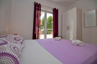 Krevet ili kreveti u jedinici u objektu Apartment with big and free private parking