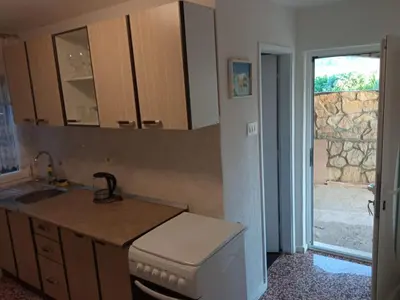 Kuhinja ili čajna kuhinja u objektu Guesthouse Eljuga Family