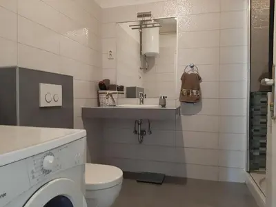 Kupaonica u objektu Postira apartment by the sea