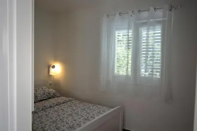 Krevet ili kreveti u jedinici u objektu Apartment on the beach - Nemira, Omiš