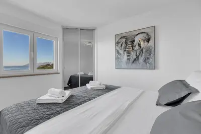 Krevet ili kreveti u jedinici u objektu Exclusive Penthouse Big Blue with private Jacuzzi