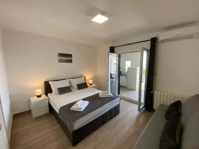 Krevet ili kreveti u jedinici u objektu Maritom Apartments