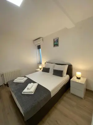 Krevet ili kreveti u jedinici u objektu Maritom Apartments