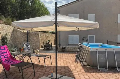 Bazen u objektu Family-friendly apartments with swimming pool Stanici, Omis - 18676 ili u blizini