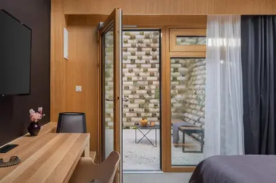 TV i/ili zabavni centar u objektu Wind Rose Wellness Villas, Villa Bura