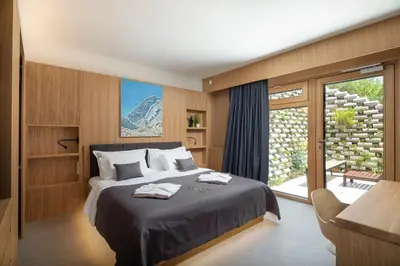 Krevet ili kreveti u jedinici u objektu Wind Rose Wellness Villas, Villa Maestral