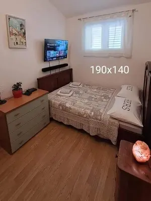 Krevet ili kreveti u jedinici u objektu Kuća za odmor Leptirić