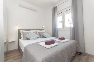 Krevet ili kreveti u jedinici u objektu Deluxe apartment White Angel